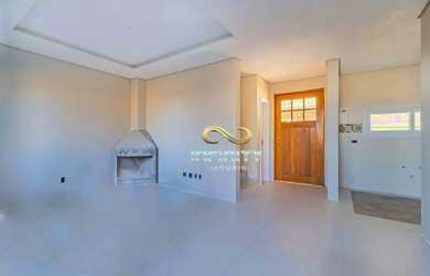 Imagem: A casa possui 3 Dormitórios, 2 Banheiros, 3 Vagas na garagem