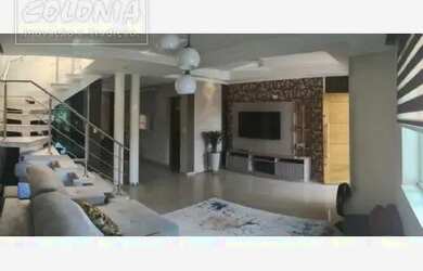 Imagem: A casa possui 3 Dormitórios, 5 Banheiros, 4 Vagas na garagem