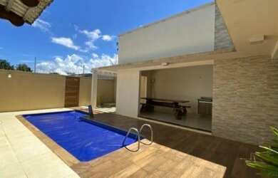 Imagem: A casa possui 3 Dormitórios, 4 Banheiros, 3 Vagas na garagem