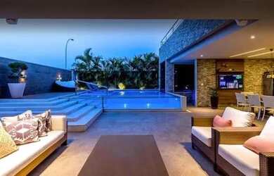 Imagem: A casa em condomínio possui 4 Dormitórios, 5 Banheiros, 3