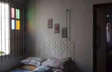 Imagem: A casa possui 3 Dormitórios, 4 Banheiros, 3 Vagas na garagem