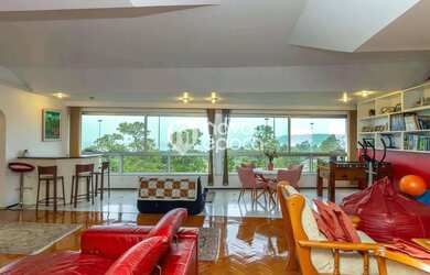 Imagem: O apartamento possui 4 Dormitórios, 5 Banheiros, 2 Vagas na