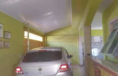 Imagem: A casa possui 3 Dormitórios, 1 Banheiro, 4 Vagas na garagem