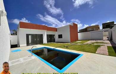 Imagem: A casa possui 2 Dormitórios, 3 Banheiros, 3 Vagas na garagem