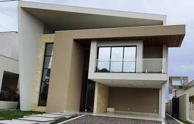 Imagem: A casa em condomínio possui 1 Dormitório, 5 Banheiros, 4 Vagas