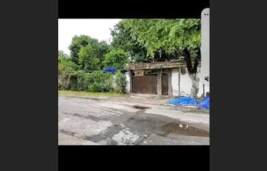 Imagem: A casa possui 3 Dormitórios, 2 Banheiros, 4 Vagas na garagem