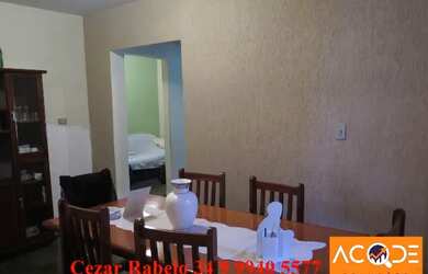 Imagem: A casa possui 3 Dormitórios, 2 Banheiros, 2 Vagas na garagem