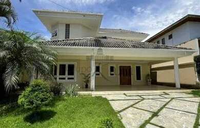 Imagem: A casa em condomínio possui 4 Dormitórios, 4 Banheiros, 4