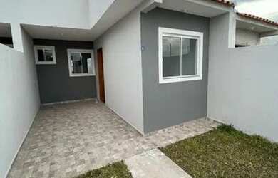 Imagem: A casa possui 2 Dormitórios, 1 Banheiro, 2 Vagas na garagem