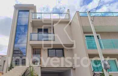 Imagem: A casa possui 3 Dormitórios, 3 Banheiros, 3 Vagas na garagem