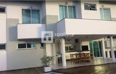 Imagem: A casa possui 4 Dormitórios, 4 Banheiros, 4 Vagas na garagem