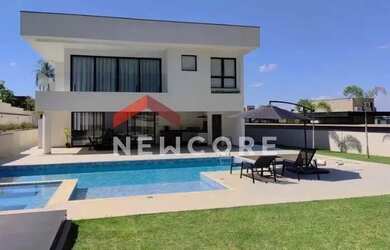 Imagem: A casa em condomínio possui 4 Dormitórios, 5 Banheiros, 4