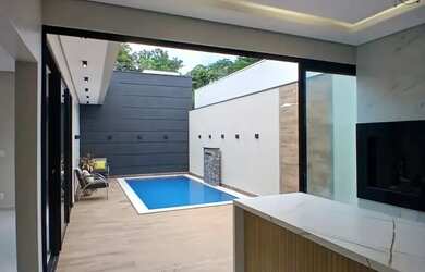 Imagem: A casa em condomínio possui 3 Dormitórios, 4 Banheiros, 5