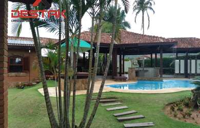 Imagem: A casa em condomínio possui 3 Dormitórios, 5 Banheiros, 4