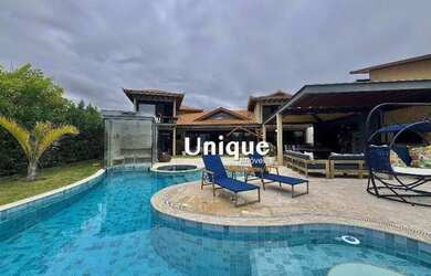 Imagem: A casa em condomínio possui 5 Dormitórios, 5 Banheiros, 5