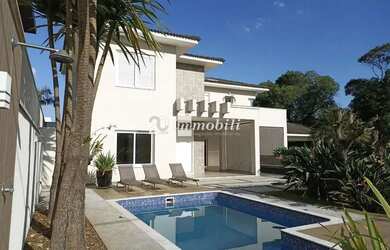 Imagem: A casa em condomínio à venda possui 4 Dormitórios, 5 Banheiros