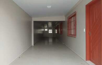 Imagem: A casa possui 3 Dormitórios, 3 Banheiros, 3 Vagas na garagem