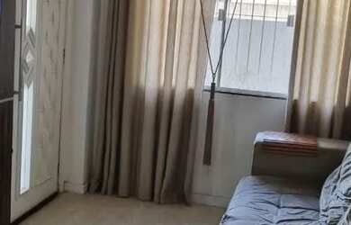 Imagem: A casa possui 2 Dormitórios, 1 Banheiro, 1 Vaga na garagem