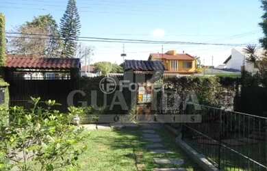 Imagem 13: Casa à venda Avenida Guarujá, Guarujá - Porto Alegre
