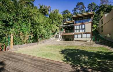 Imagem: A casa em condomínio possui 4 Dormitórios, 5 Banheiros, 4