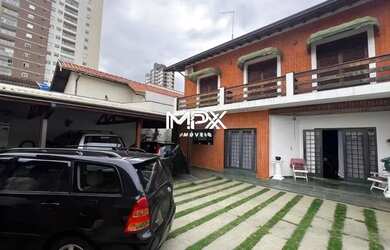 Imagem: A casa possui 4 Dormitórios, 5 Banheiros, 5 Vagas na garagem