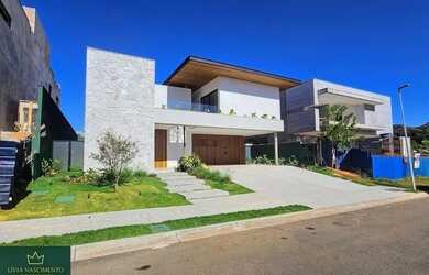 Imagem: A casa possui 5 Dormitórios, 5 Banheiros, 5 Vagas na garagem