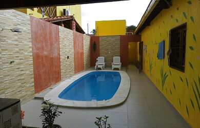 Imagem: A casa possui 3 Dormitórios, 3 Banheiros e 1 Vaga na garagem