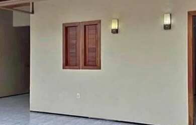 Imagem: A casa possui 3 Dormitórios, 2 Banheiros, 1 Vaga na garagem