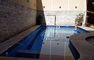 Imagem: A casa possui 4 Dormitórios, 5 Banheiros, 5 Vagas na garagem