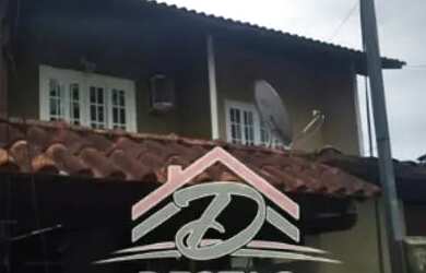 Imagem: A casa possui 2 Dormitórios, 2 Banheiros, 1 Vaga na garagem