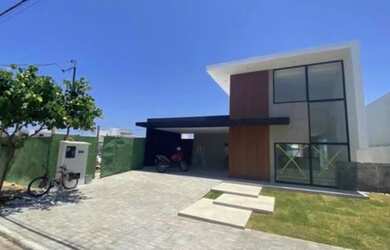 Imagem: A casa possui 3 Dormitórios, 3 Banheiros, 4 Vagas na garagem