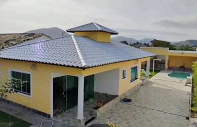 Imagem: A casa possui 2 Dormitórios, 3 Banheiros, 3 Vagas na garagem