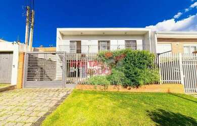 Imagem: A casa possui 5 Dormitórios, 5 Banheiros, 5 Vagas na garagem