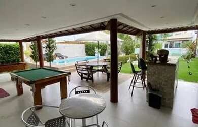 Imagem: A casa possui 4 Dormitórios e 4 Banheiros e está localizado