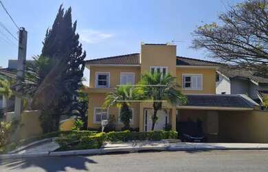 Imagem: A casa em condomínio possui 4 Dormitórios, 5 Banheiros, 5