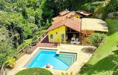 Imagem: A casa em condomínio possui 5 Dormitórios, 4 Banheiros, 4