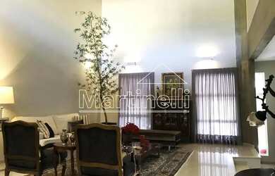 Imagem: A casa à venda possui 4 Dormitórios, 5 Banheiros, 4 Vagas