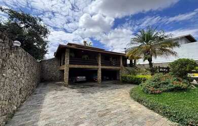 Imagem: A casa possui 5 Dormitórios, 5 Banheiros, 5 Vagas na garagem