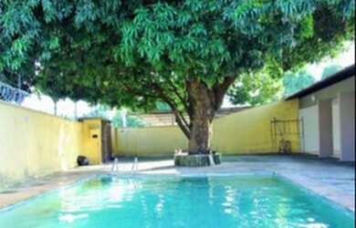 Imagem: A casa possui 5 Dormitórios, 5 Banheiros, 5 Vagas na garagem