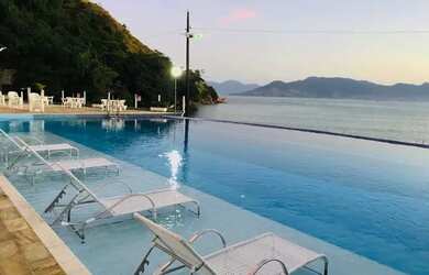 Imagem 13: Aluga temporada apartamento pé na areia com piscina borda infinita