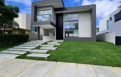 Imagem: A casa possui 4 Dormitórios, 5 Banheiros, 2 Vagas na garagem