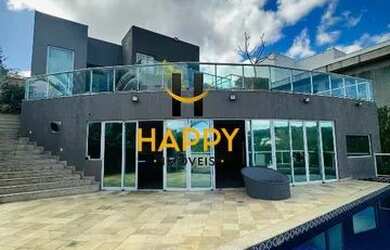 Imagem: A casa em condomínio possui 4 Dormitórios, 5 Banheiros, 4