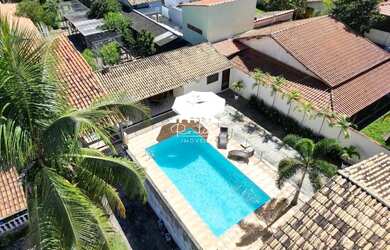 Imagem: A casa possui 3 Dormitórios, 4 Banheiros, 4 Vagas na garagem