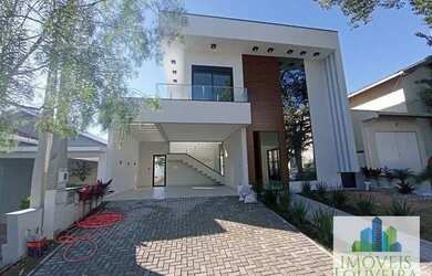 Imagem: A casa em condomínio possui 4 Dormitórios, 5 Banheiros, 4