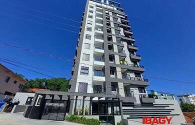 Imagem: O apartamento possui 2 Dormitórios, 3 Banheiros, 2 Vagas na