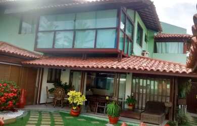 Imagem: A casa possui 3 Dormitórios, 4 Banheiros, 4 Vagas na garagem