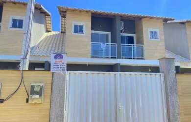 Imagem: A casa possui 2 Dormitórios, 3 Banheiros, 1 Vaga na garagem