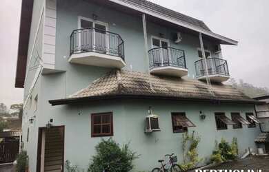 Imagem: A casa possui 2 Dormitórios, 1 Banheiro, 1 Vaga na garagem