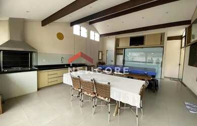 Imagem: A casa possui 3 Dormitórios, 4 Banheiros, 3 Vagas na garagem