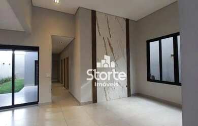 Imagem: A casa possui 3 Dormitórios, 3 Banheiros, 3 Vagas na garagem